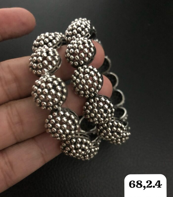 Ornate silver beaded bracelet close-up